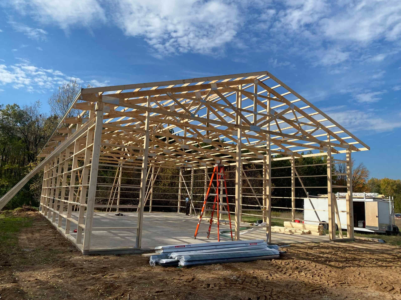 Post-frame building structure under construction